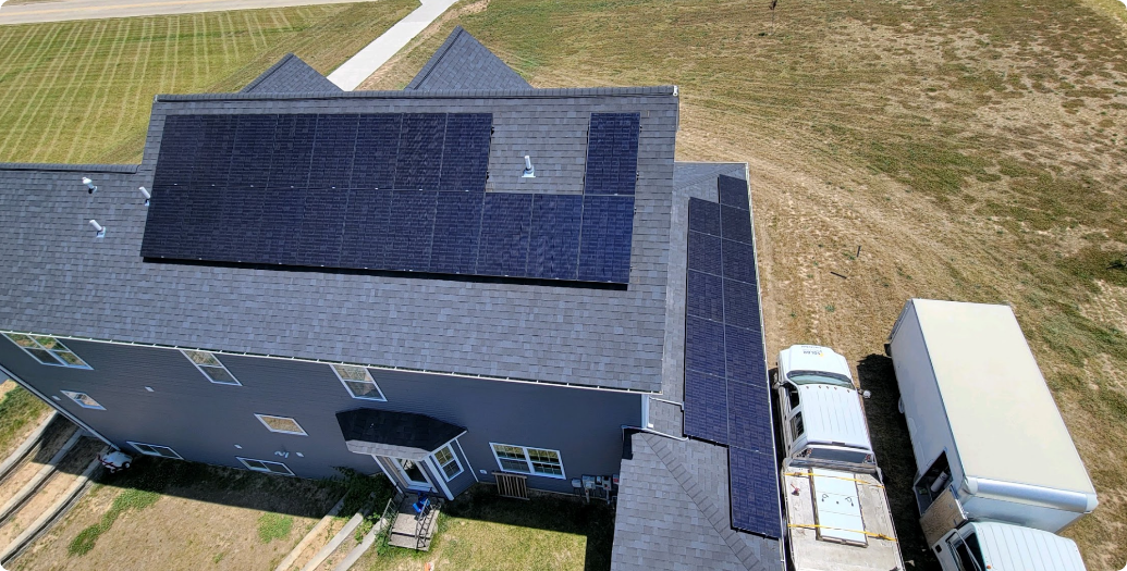 drone shot of house with solar