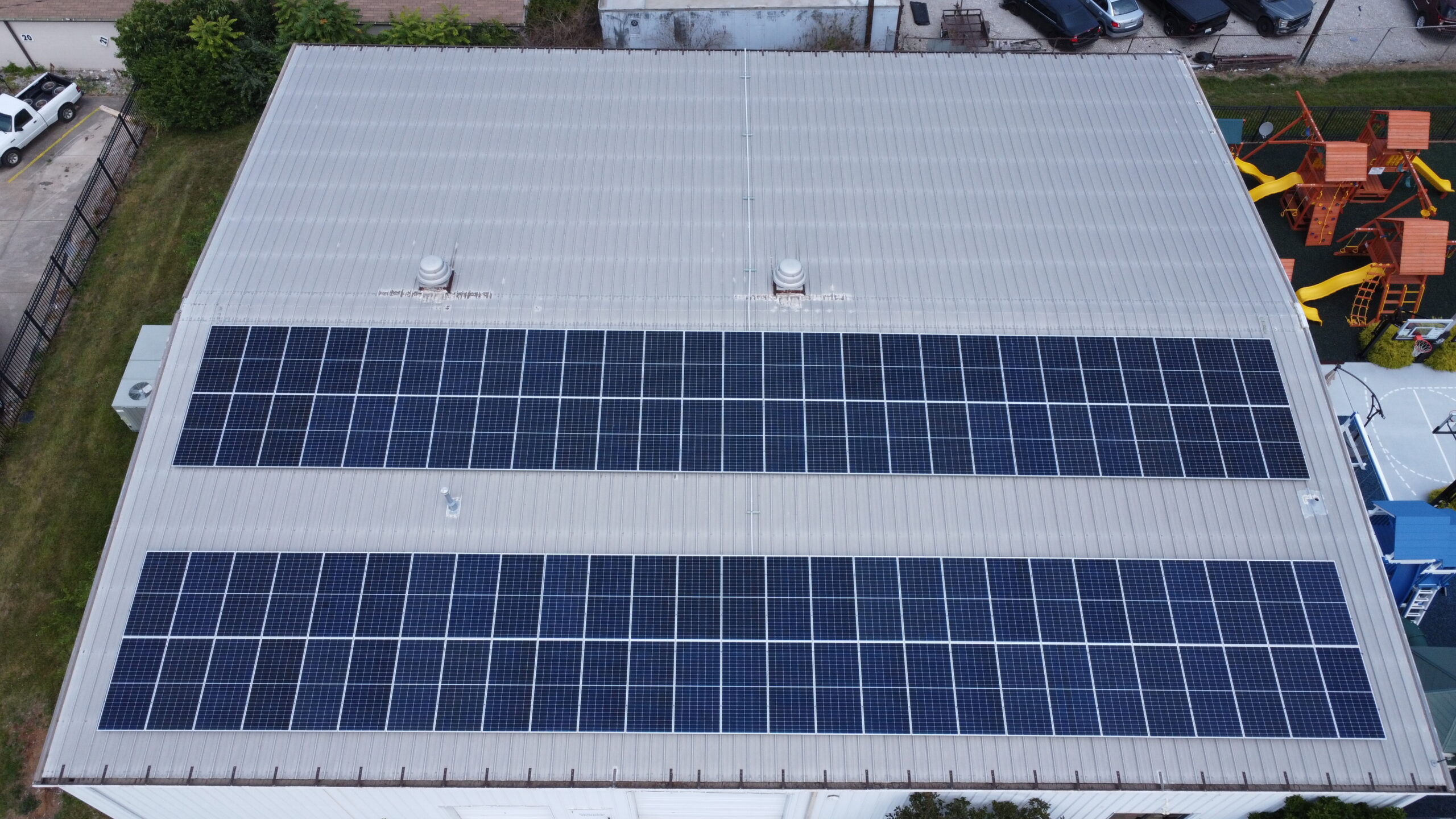 Drone shot of commercial building with Solar